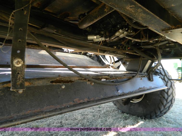 image for item K8208 1997 MacDon 9300 self-propelled windrower