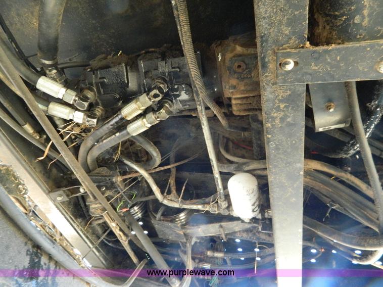 image for item K8208 1997 MacDon 9300 self-propelled windrower