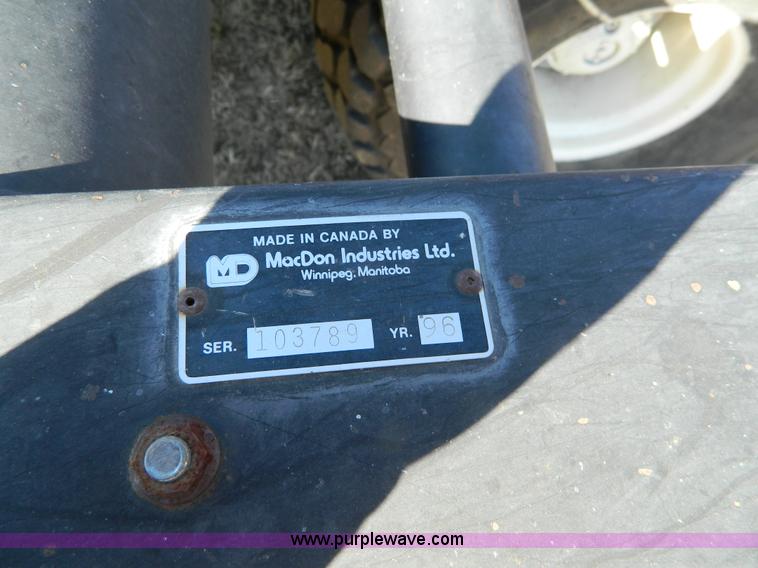 image for item K8208 1997 MacDon 9300 self-propelled windrower