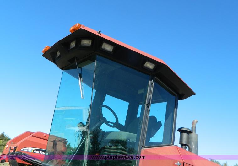 image for item K8208 1997 MacDon 9300 self-propelled windrower