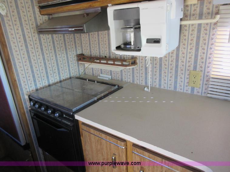 image for item I1910 1984 Chevrolet Holiday Rambler Presidental 33 RV