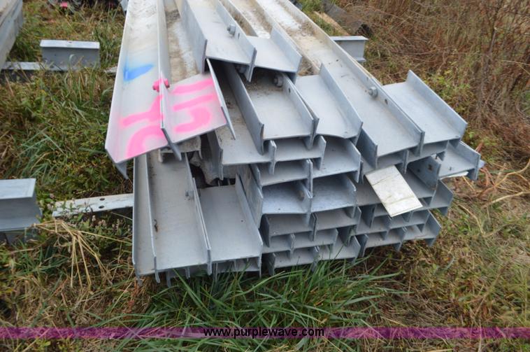 image for item I6342 Approximately 42 galvanized guard rail posts