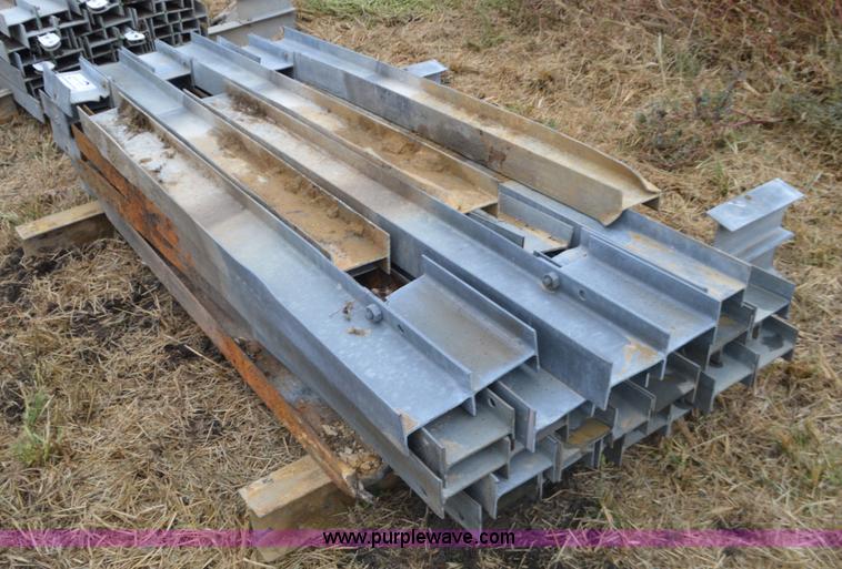 image for item I6351 Approximately 32 guard rail posts