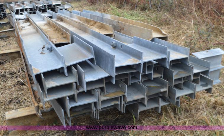 image for item I6351 Approximately 32 guard rail posts