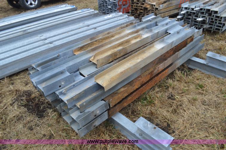 image for item I6351 Approximately 32 guard rail posts