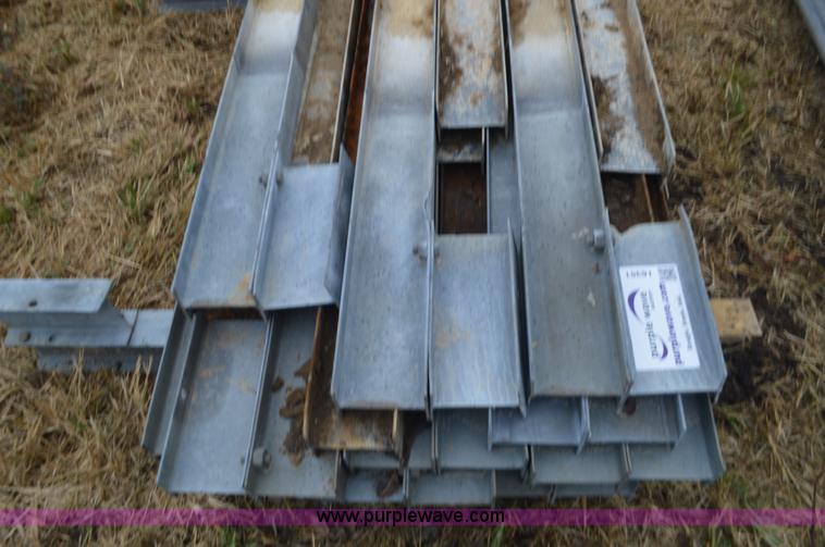 image for item I6351 Approximately 32 guard rail posts