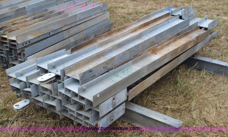 image for item I6354 Approximately 33 guard rail posts