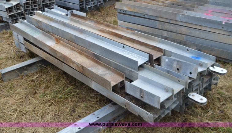 image for item I6354 Approximately 33 guard rail posts