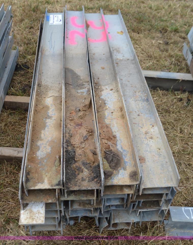 image for item I6355 Approximately 32 guard rail posts