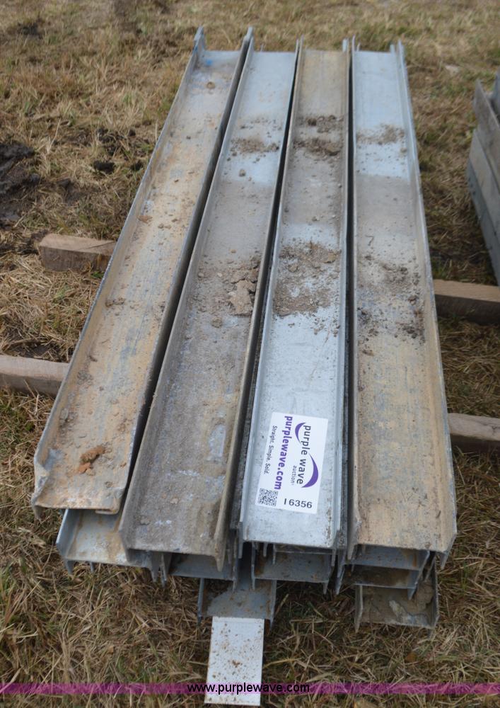 image for item I6356 Approximately 32 guard rail posts