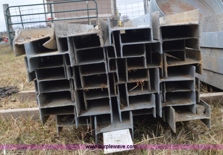 image for item I6356 Approximately 32 guard rail posts