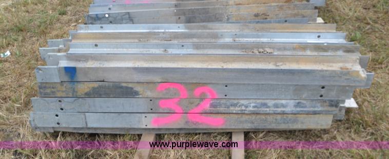 image for item I6356 Approximately 32 guard rail posts