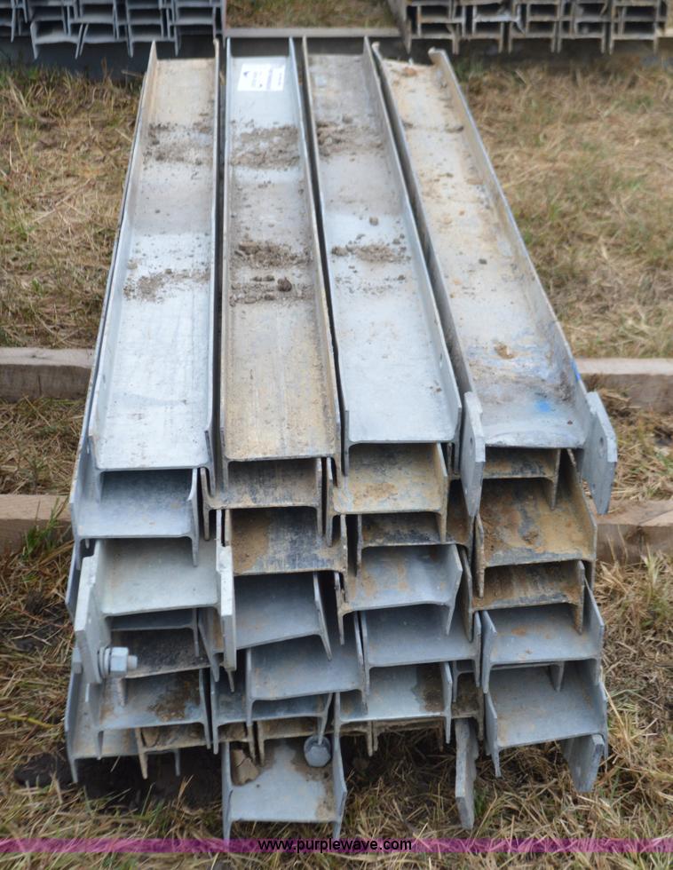 image for item I6356 Approximately 32 guard rail posts