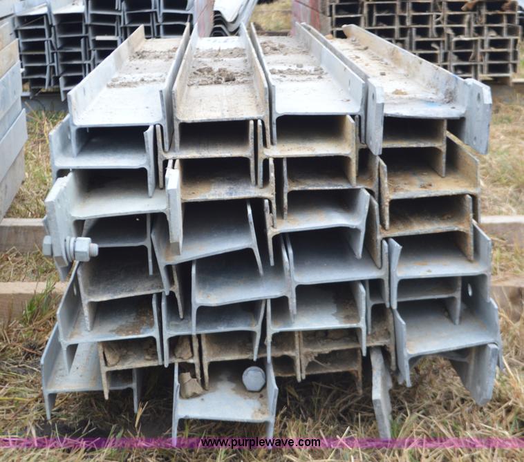 image for item I6356 Approximately 32 guard rail posts