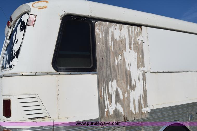 image for item J7076 1974 Eagle tour bus