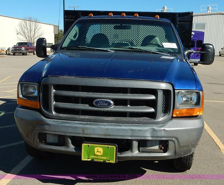 image for item L3546 1999 Ford F350 Super Duty XL flatbed pickup truck