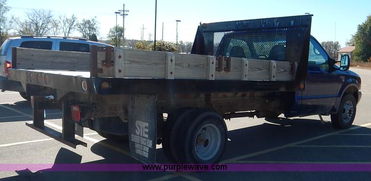 image for item L3546 1999 Ford F350 Super Duty XL flatbed pickup truck
