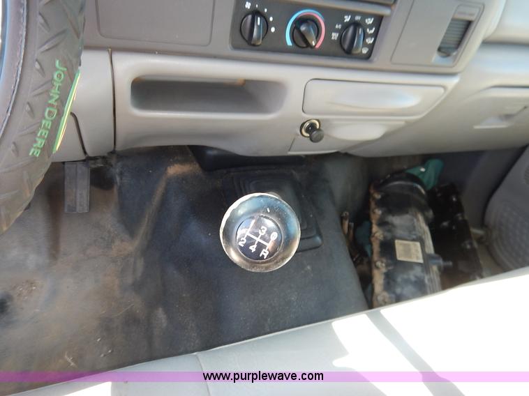 image for item L3546 1999 Ford F350 Super Duty XL flatbed pickup truck