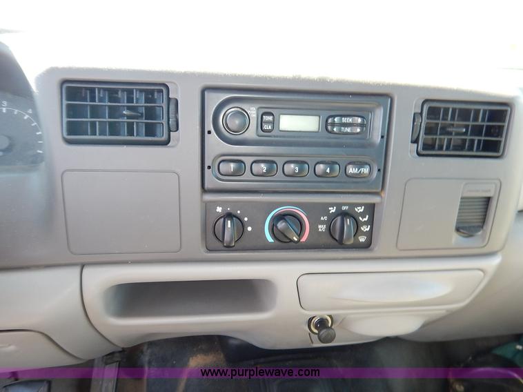 image for item L3546 1999 Ford F350 Super Duty XL flatbed pickup truck