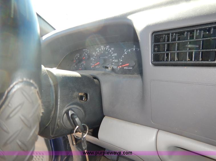 image for item L3546 1999 Ford F350 Super Duty XL flatbed pickup truck