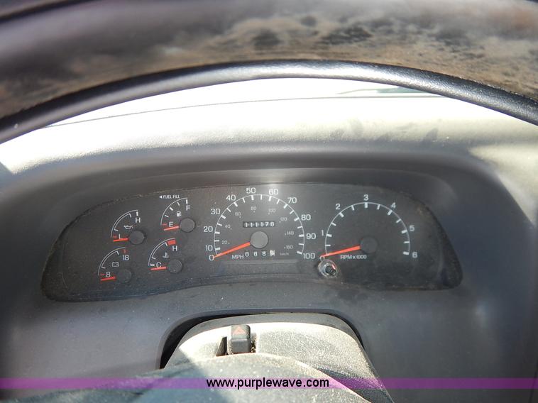 image for item L3546 1999 Ford F350 Super Duty XL flatbed pickup truck