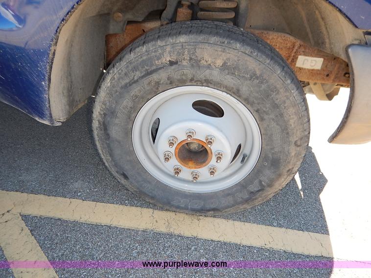 image for item L3546 1999 Ford F350 Super Duty XL flatbed pickup truck