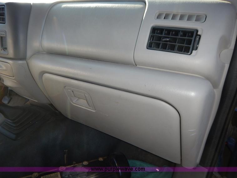 image for item L3546 1999 Ford F350 Super Duty XL flatbed pickup truck