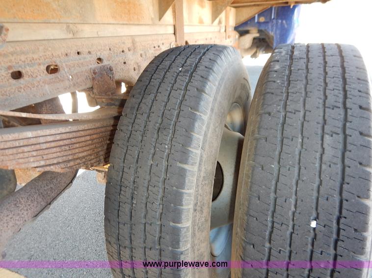 image for item L3546 1999 Ford F350 Super Duty XL flatbed pickup truck