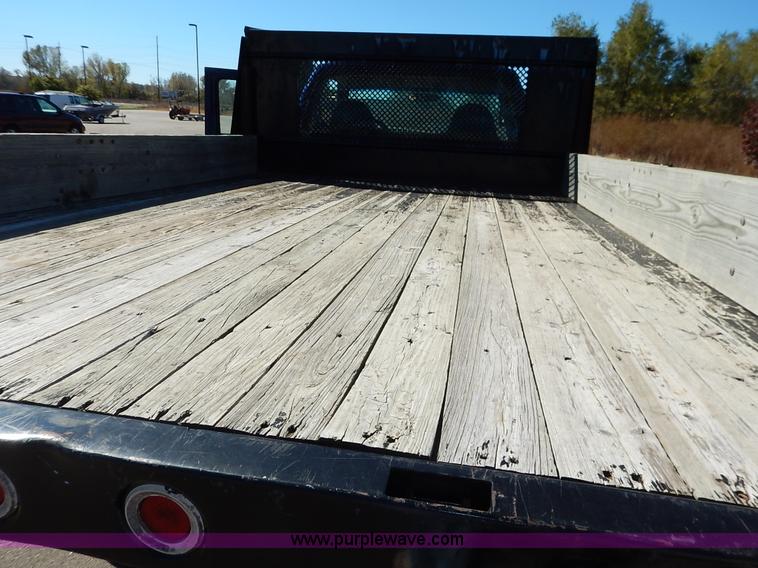 image for item L3546 1999 Ford F350 Super Duty XL flatbed pickup truck