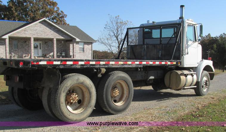 image for item L5306 1986 Volvo White flatbed truck