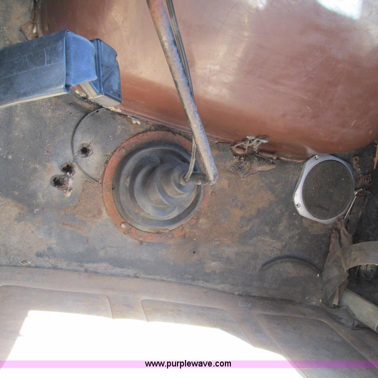 image for item L5306 1986 Volvo White flatbed truck