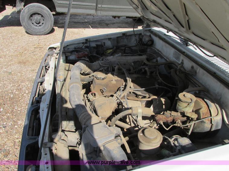 image for item R9490 1987 Toyota flatbed pickup truck