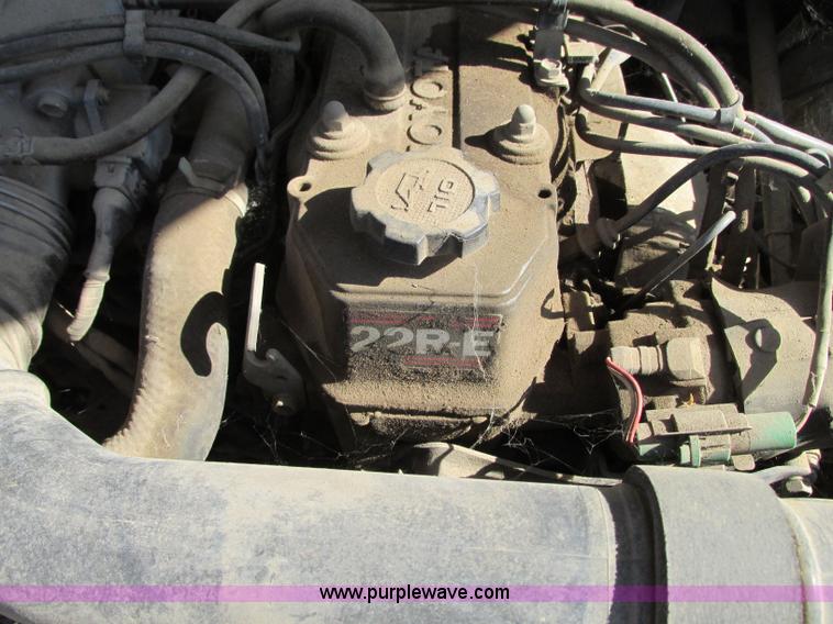 image for item R9490 1987 Toyota flatbed pickup truck