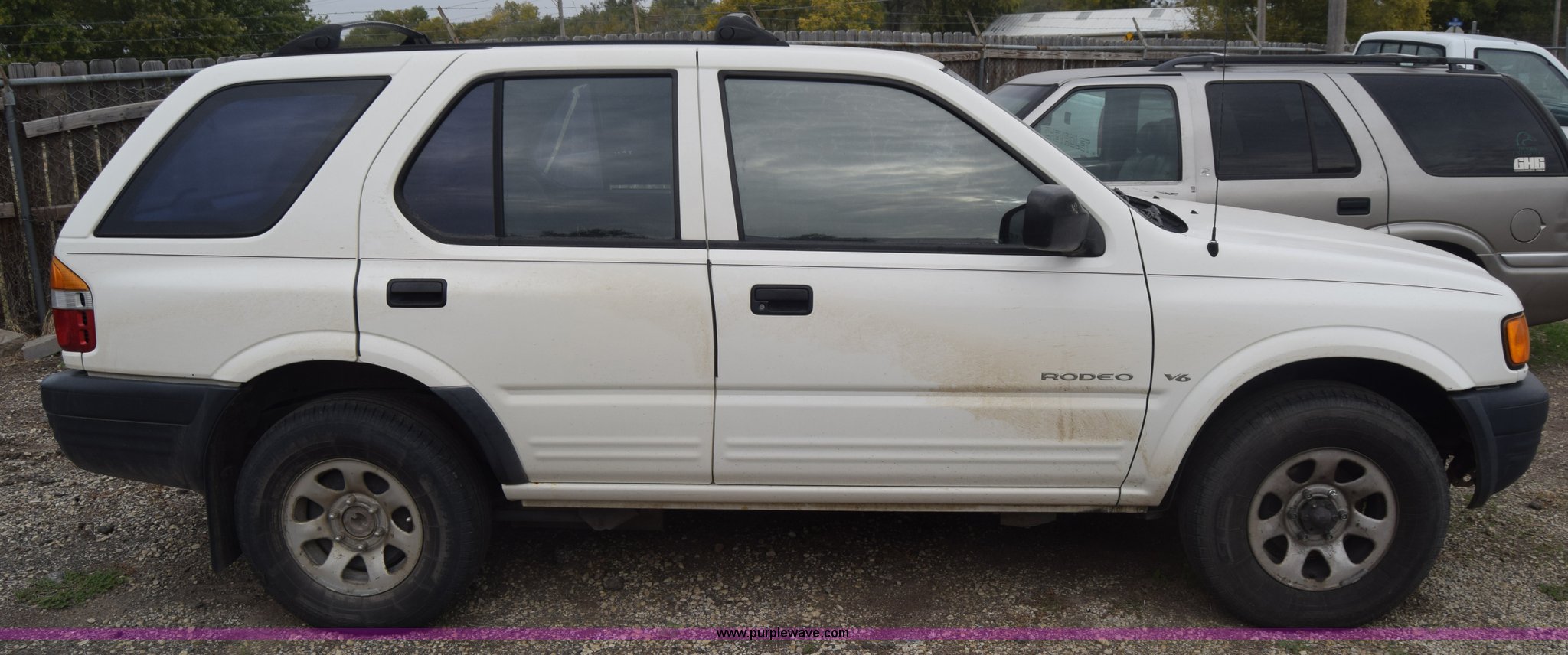 1999 Isuzu Rodeo SUV in McPherson, KS | Item J7017 sold | Purple Wave