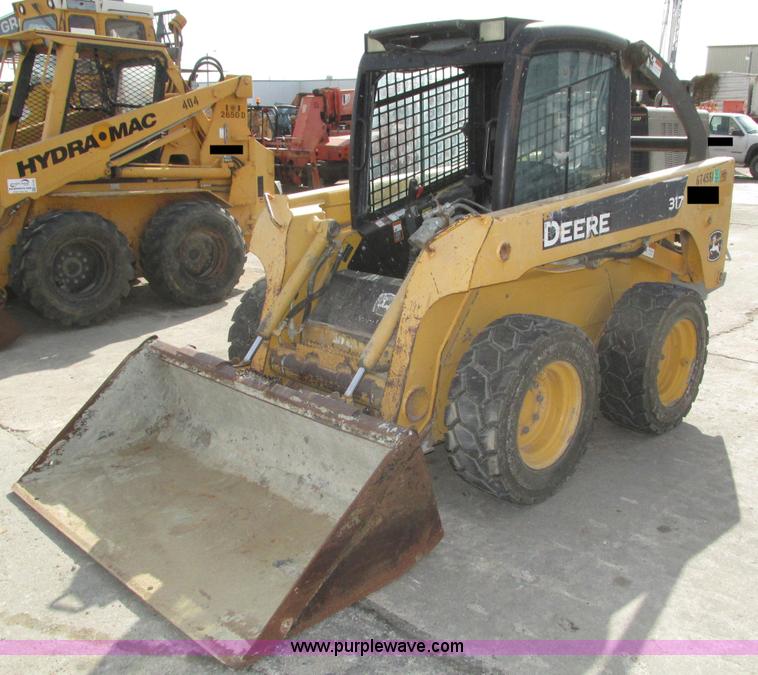image for item H1107 2005 John Deere 317 skid steer