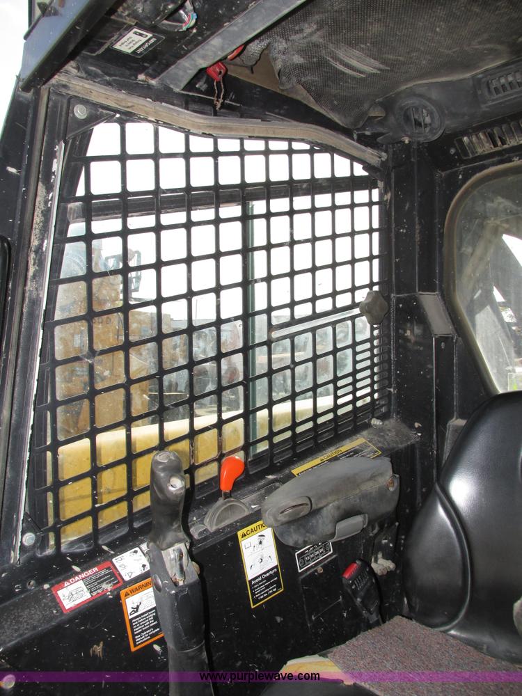 image for item H1107 2005 John Deere 317 skid steer