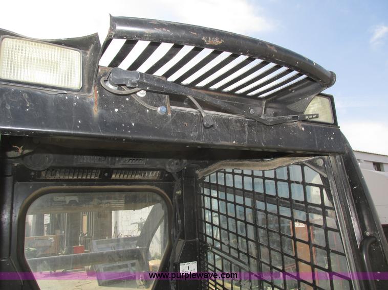 image for item H1107 2005 John Deere 317 skid steer