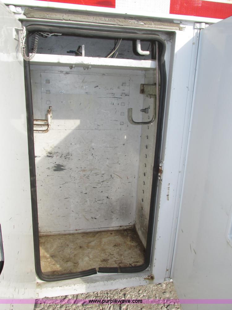 image for item H1112 2002 Altec utility bed with boom