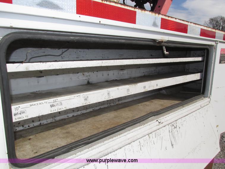 image for item H1112 2002 Altec utility bed with boom