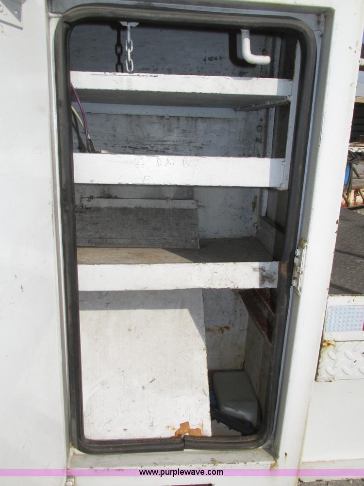 image for item H1112 2002 Altec utility bed with boom