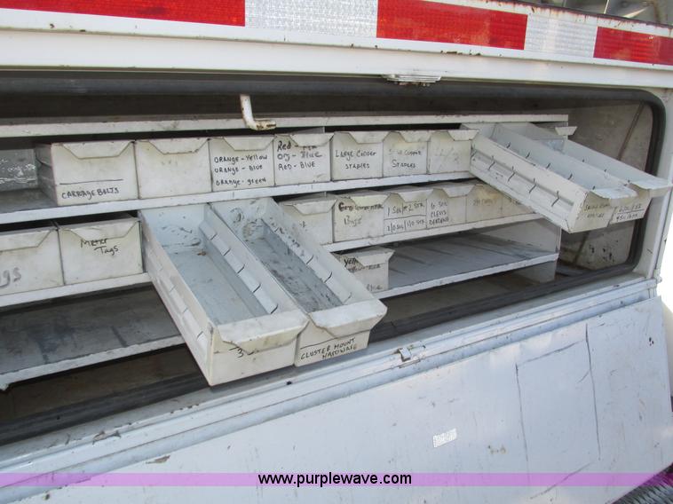 image for item H1112 2002 Altec utility bed with boom