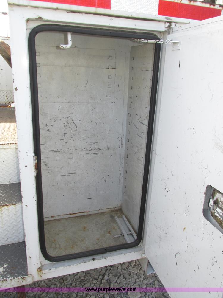 image for item H1112 2002 Altec utility bed with boom