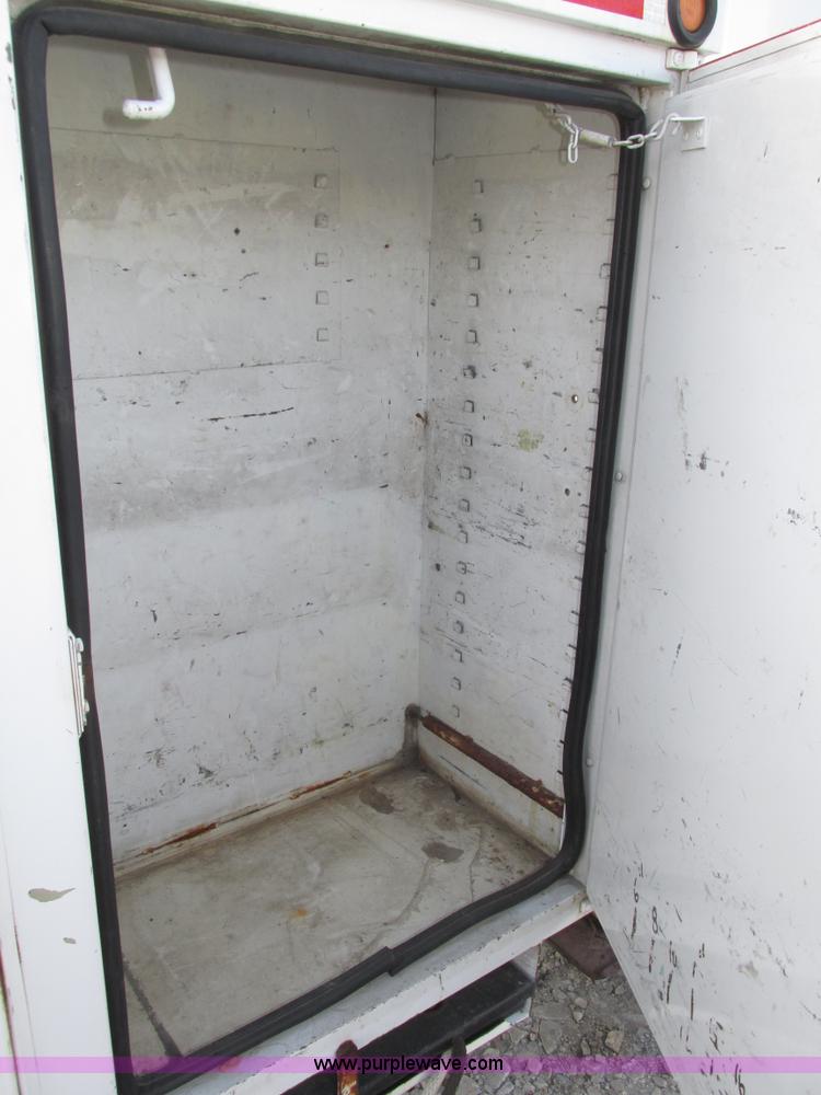 image for item H1112 2002 Altec utility bed with boom