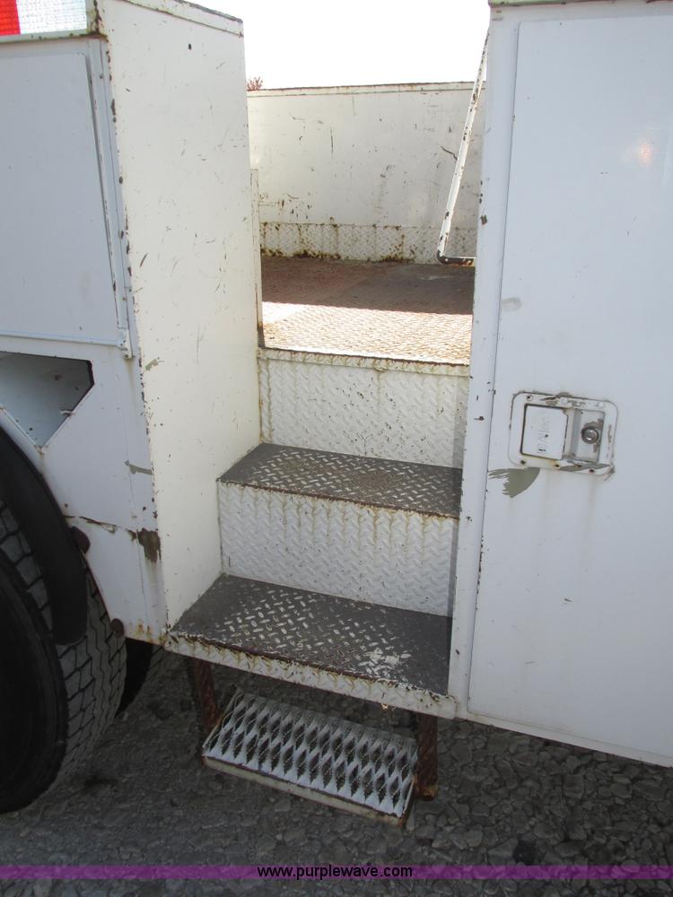 image for item H1112 2002 Altec utility bed with boom