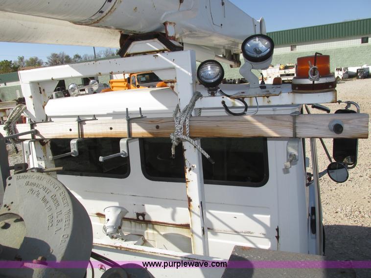 image for item H1112 2002 Altec utility bed with boom