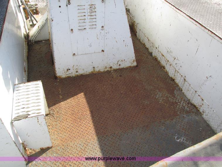 image for item H1112 2002 Altec utility bed with boom