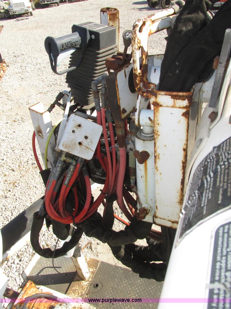 image for item H1112 2002 Altec utility bed with boom