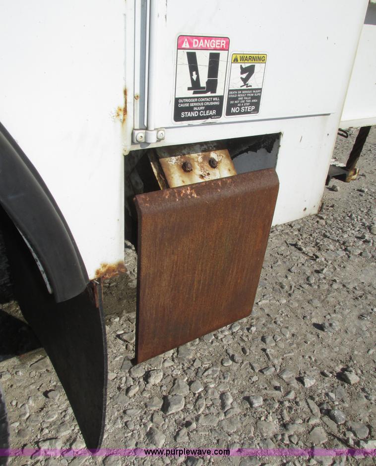 image for item H1112 2002 Altec utility bed with boom