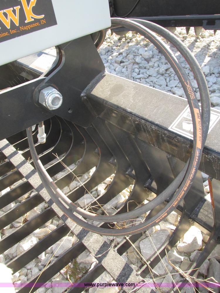 image for item H1114 Tomahawk rock grapple bucket