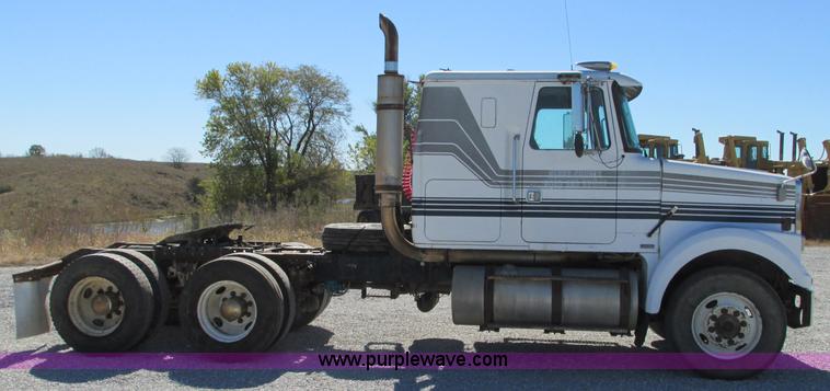 image for item J8726 1987 Volvo White WIM semi truck